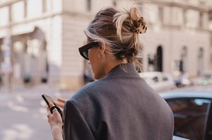 Blonde woman with neat professional low bun hairstyle